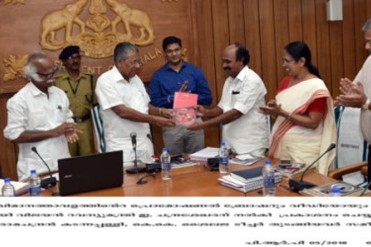 Chief Minister Pinarayi Vijayan releasing brochure