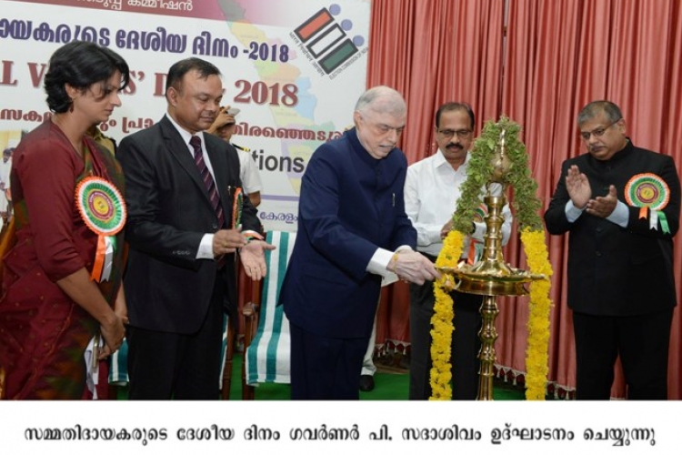 Governor P. Sathasivam inaugurating national voter's day