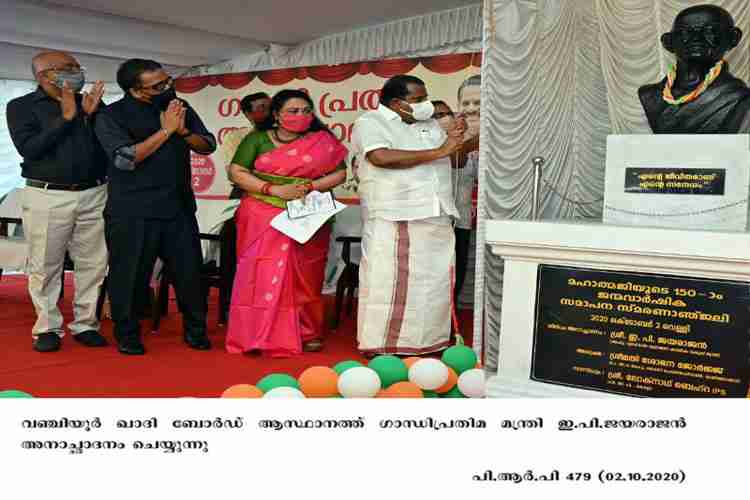 Minister EP Jayarajan unveils the Gandhi statue at Vanchiyoor Khadi board office