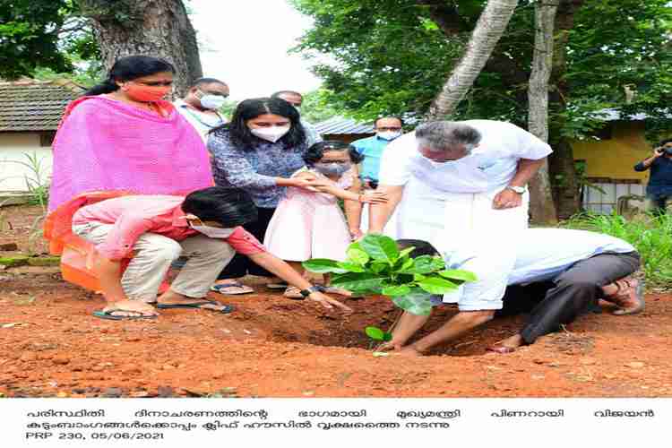 Chief minister Pinarayi Vijayan plants tree saplings as part of environment day celebrations at Cliff house
