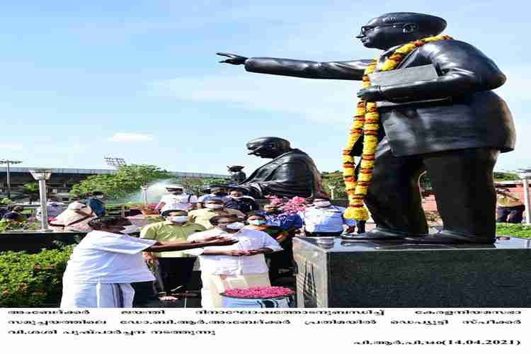 Deputy Speaker V. Sasi  pays floral tribute to the statue of BR Ambedkar as part of  Ambedkar Jayanthi