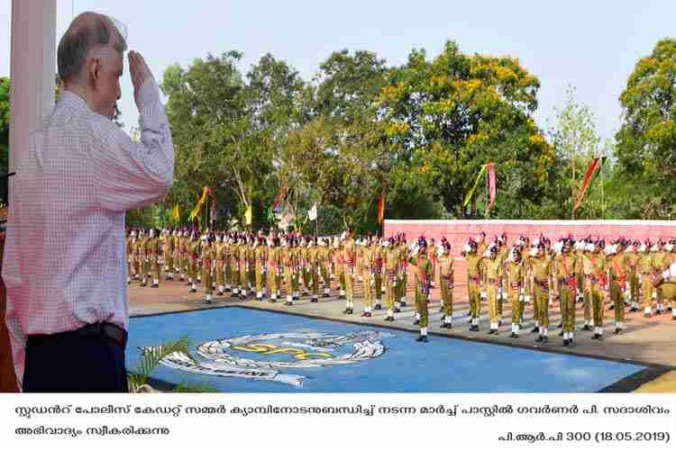 Governor P. Sathasivam receiving guard of honour from SPC