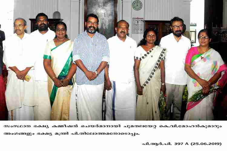 Food Commission Chairman and members with Food and Civil Supplies Minister P Thilothaman